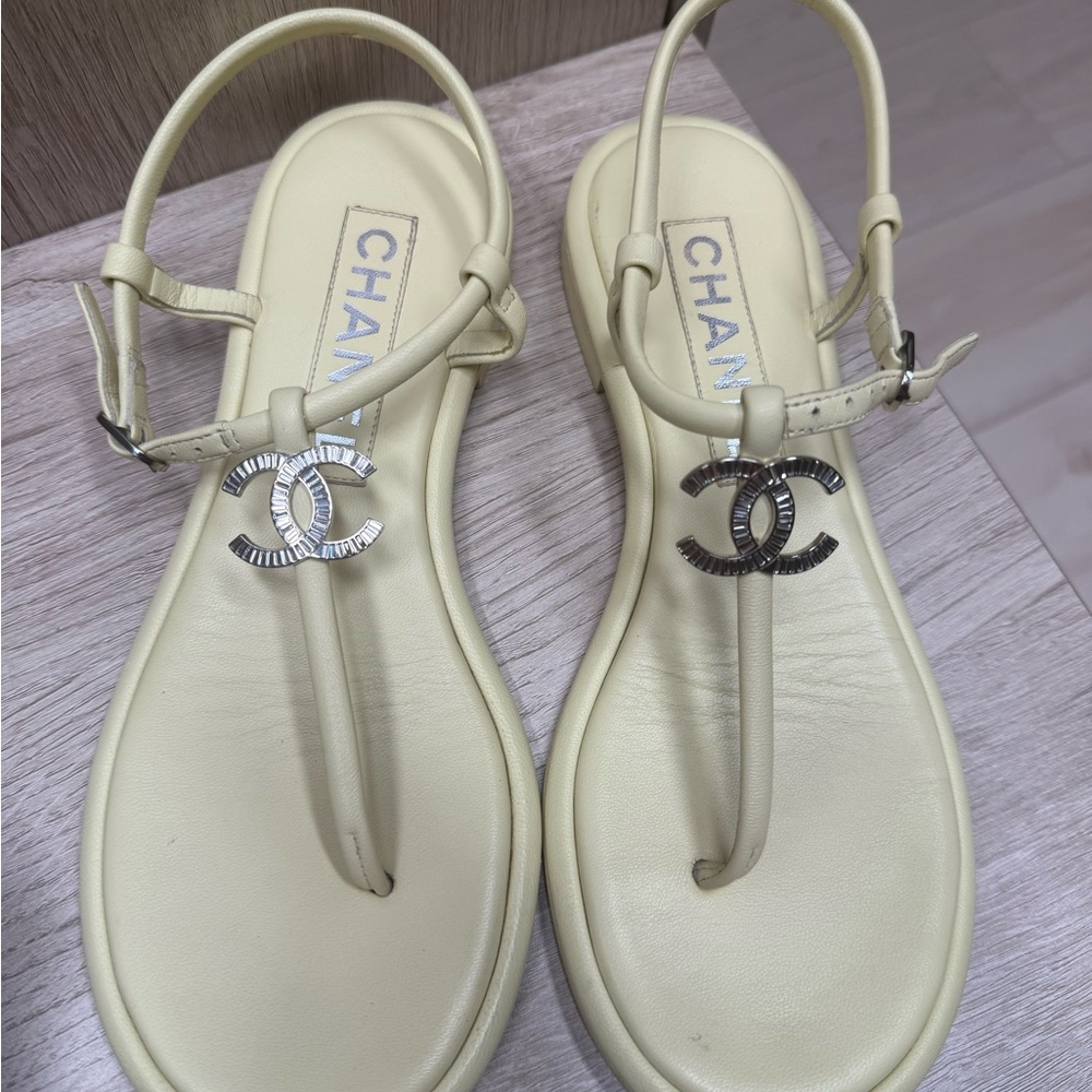 CHANEL Beige Sandals with Silver Logo